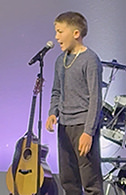 Young man reciting 1 Corinthians chapter 13 from memory
