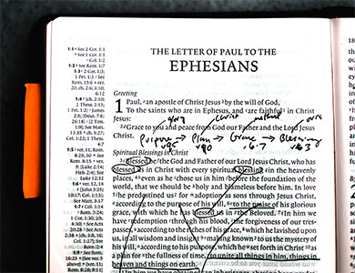 Photo of Bible page open to Ephesians 1:1, photo by Ben Finley